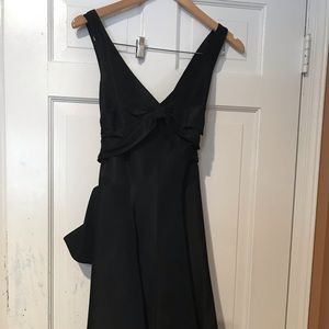 Black mid length formal dress.  Jackie O style